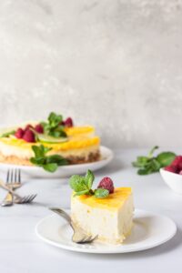 Piece,Of,Lemon,Mousse,Vanilla,Cheesecake,With,Lemon,Curd,Decorated